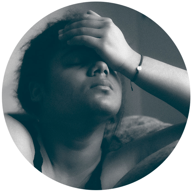 Exhausted women resting her head in her hand